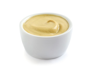 Photo of Delicious mustard in bowl on white background. Spicy sauce