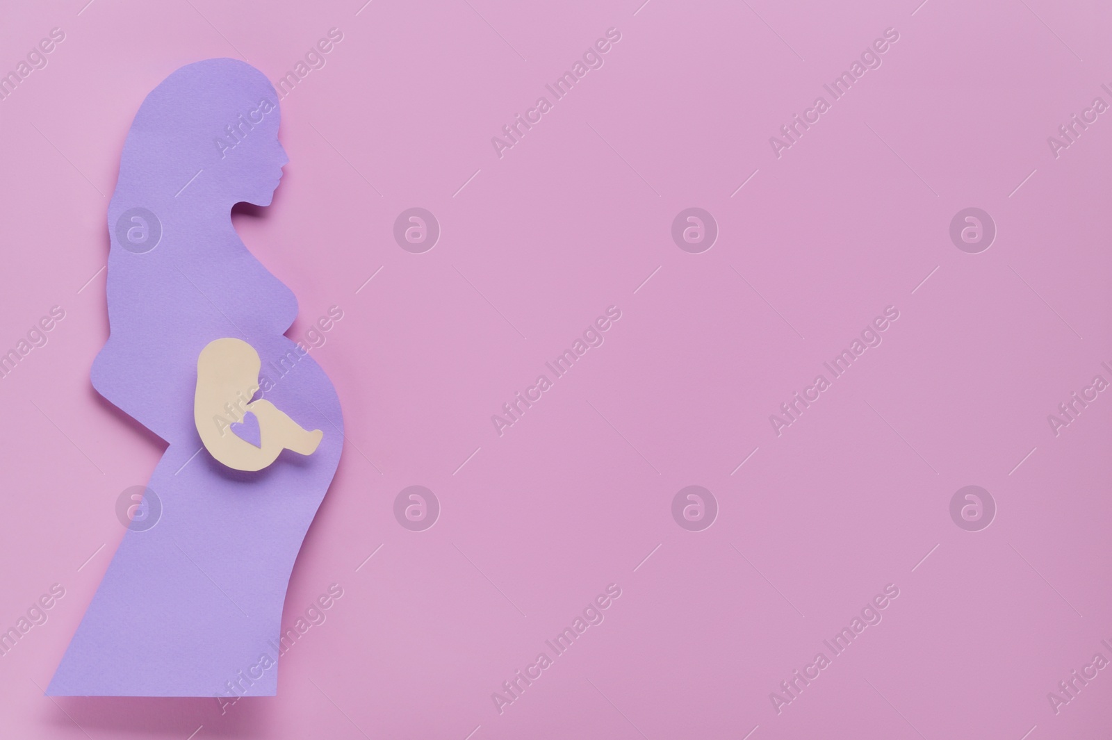 Photo of Woman`s health. Pregnant woman with baby on pale pink background, top view and space for text