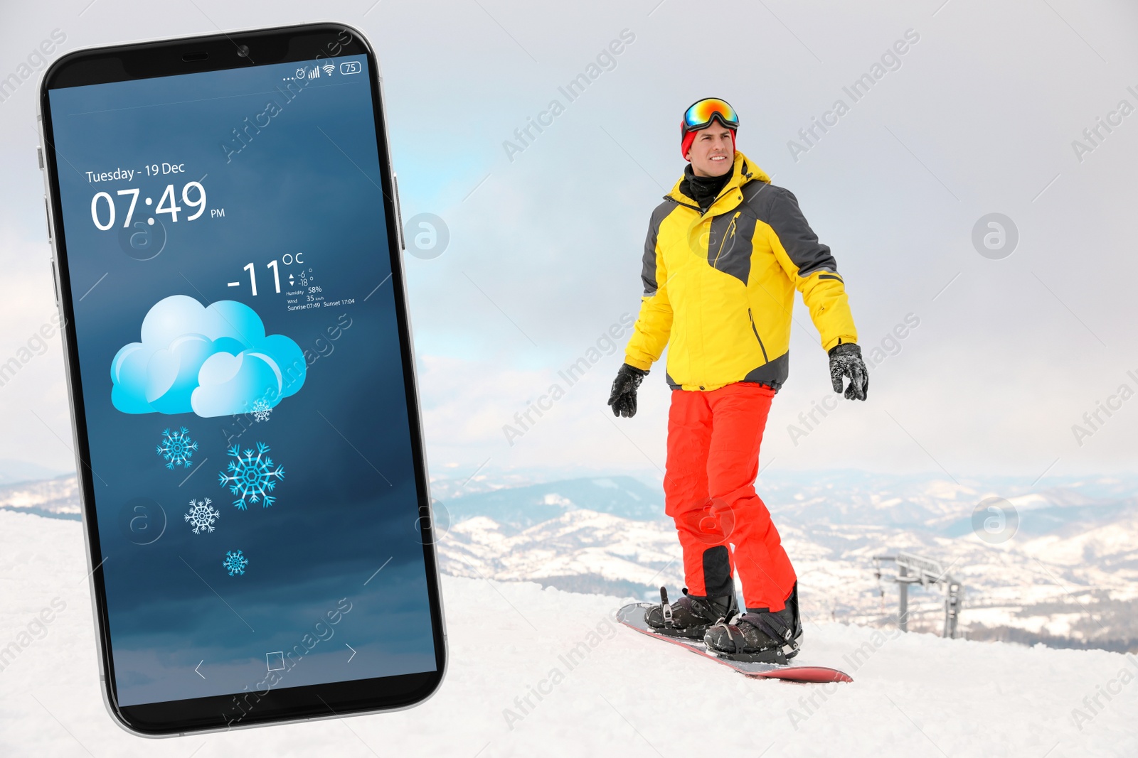 Image of Male snowboarder on snowy hill and smartphone with open weather forecast app 