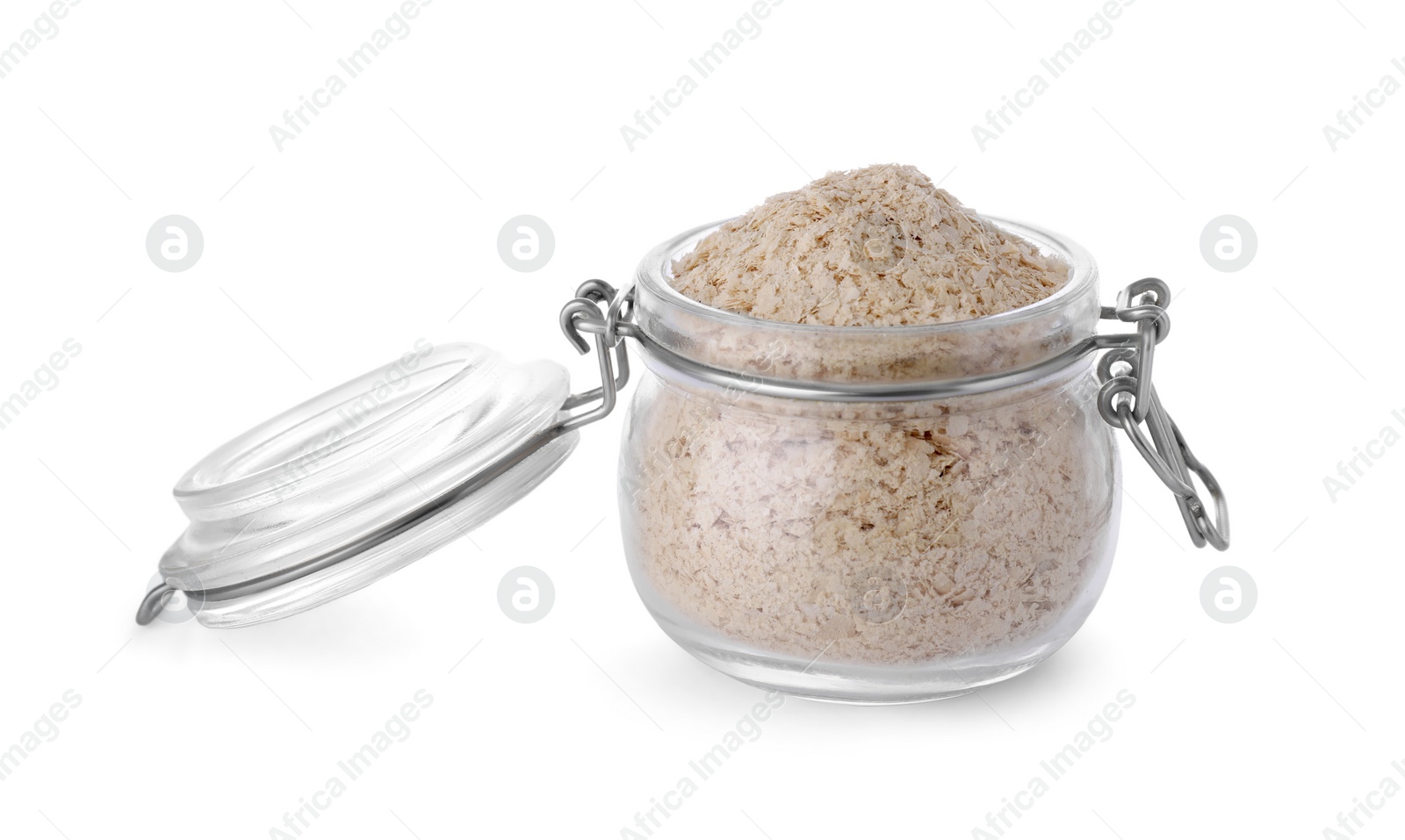 Photo of Brewer's yeast flakes in glass jar isolated on white