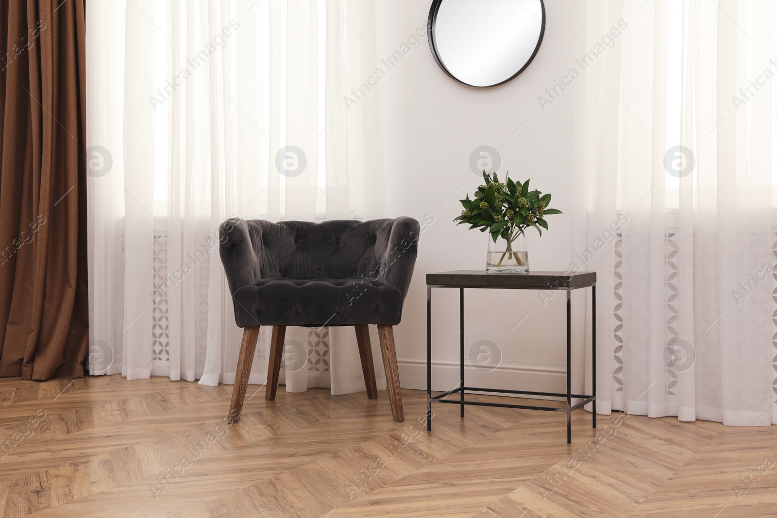 Photo of Modern living room with parquet flooring and stylish furniture