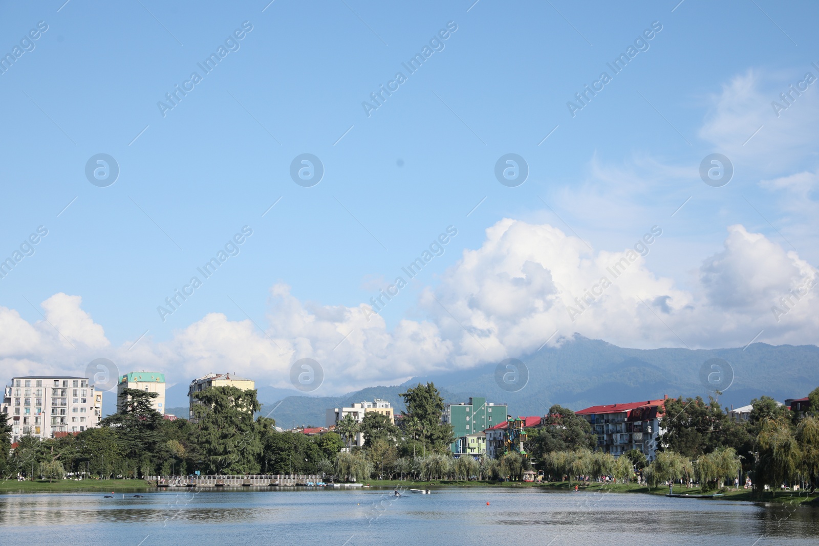 Photo of Batumi, Georgia - October 12, 2022: Picturesque view of city near Nurigeli lake and mountains