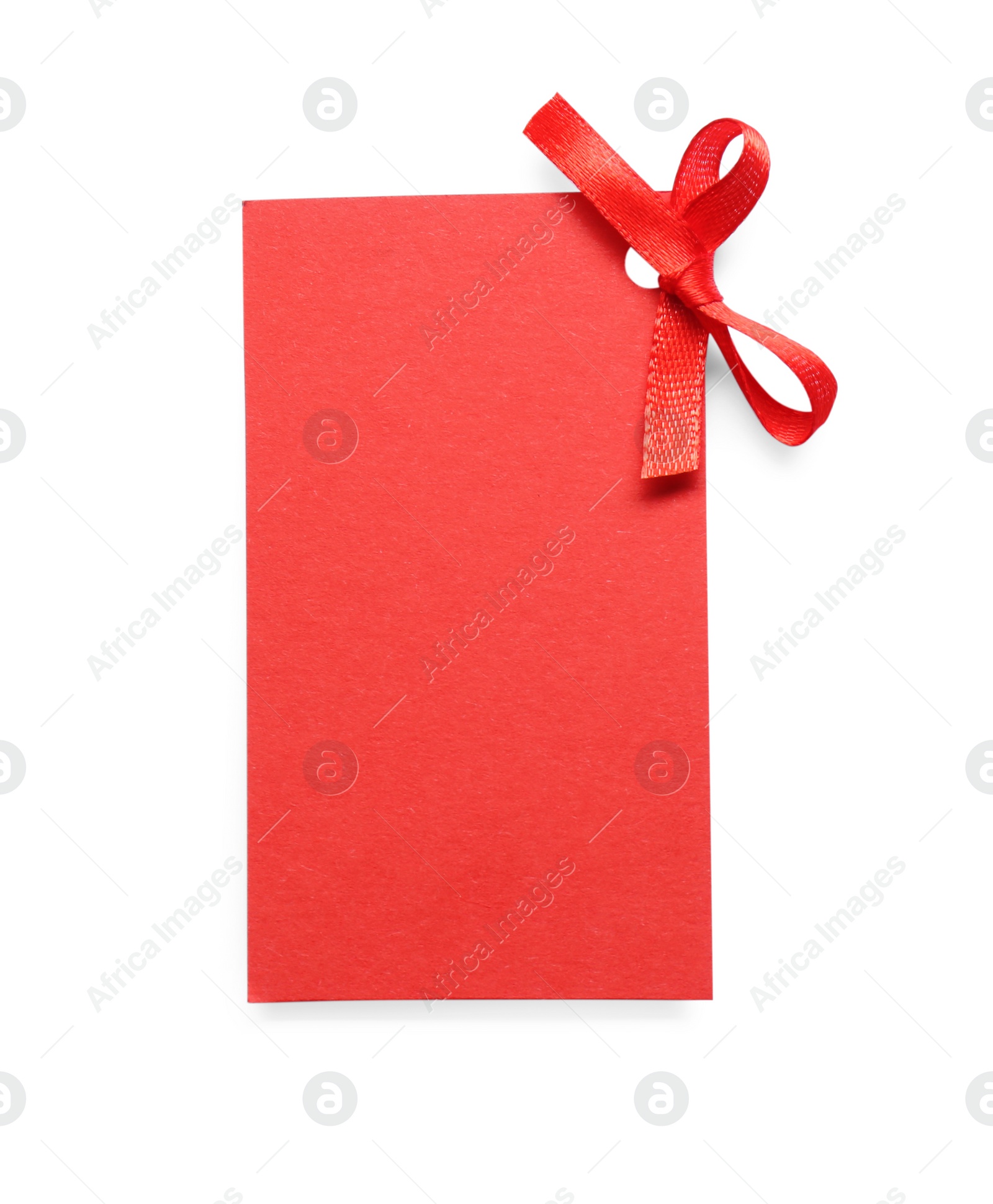 Photo of Blank red gift tag with satin ribbon on white background, top view