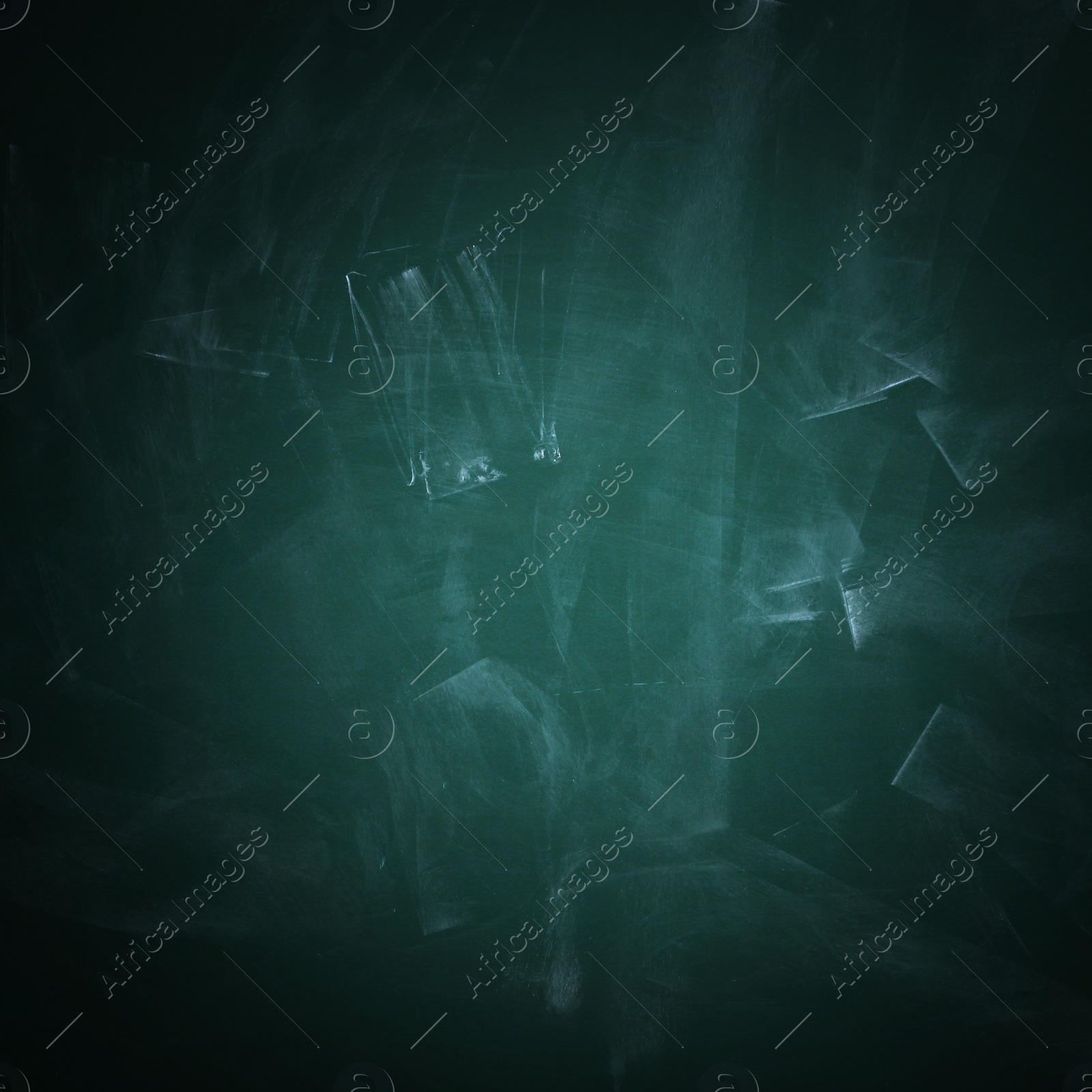 Image of Dirty green chalkboard as background. Vignette effect