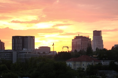 KYIV, UKRAINE - MAY 23, 2019: City district with modern buildings at sunset