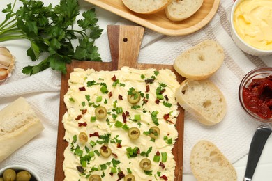 Photo of Flat lay composition with fresh butter board and bread on table