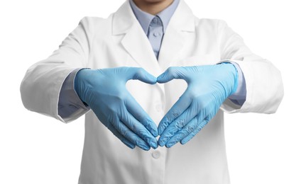 Doctor wearing light blue medical gloves making heart gesture on white background, closeup
