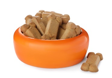 Photo of Bone shaped dog cookies and feeding bowl on white background
