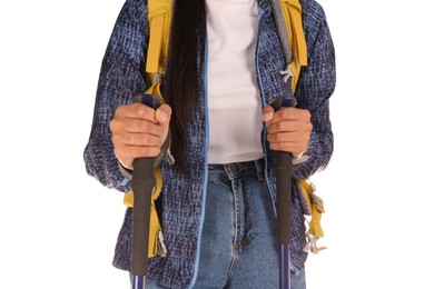 Woman with backpack and trekking poles on white background, closeup