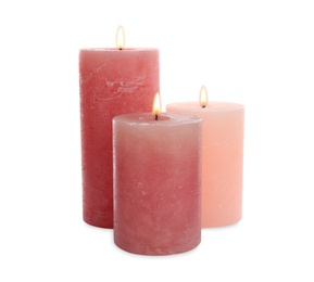 Photo of New pillar wax candles on white background
