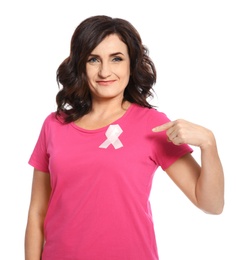 Photo of Woman with silk ribbon on white background. Breast cancer awareness concept