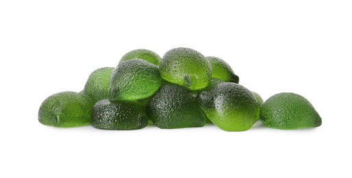 Photo of Pile of delicious gummy lime candies on white background