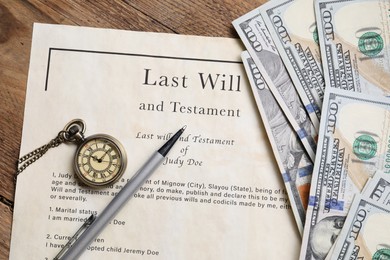Photo of Last Will and Testament, pocket watch, dollar bills and pen on wooden table, flat lay