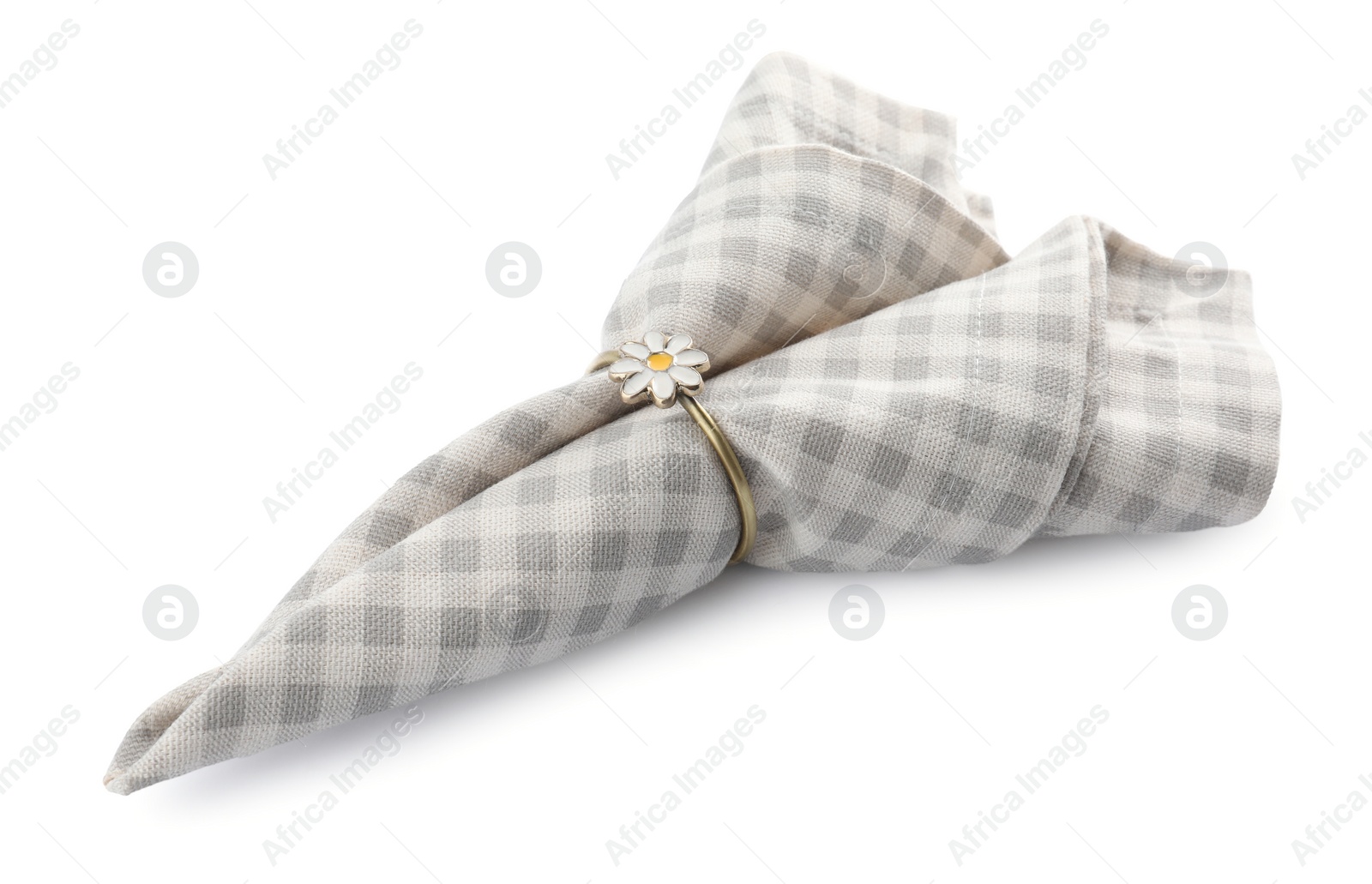 Photo of Napkin with decorative ring for table setting isolated on white