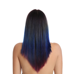 Photo of Young woman with bright dyed hair on white background, back view