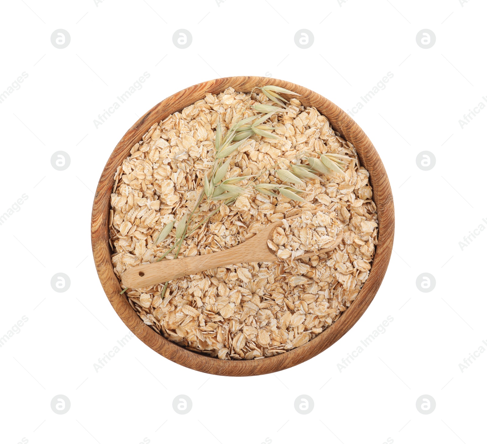 Photo of Bowl with scoop of oatmeal and florets isolated on white, top view