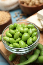 Photo of Fresh green soy beans and other organic products on table, closeup