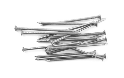 Photo of Pile of metal nails on white background, top view