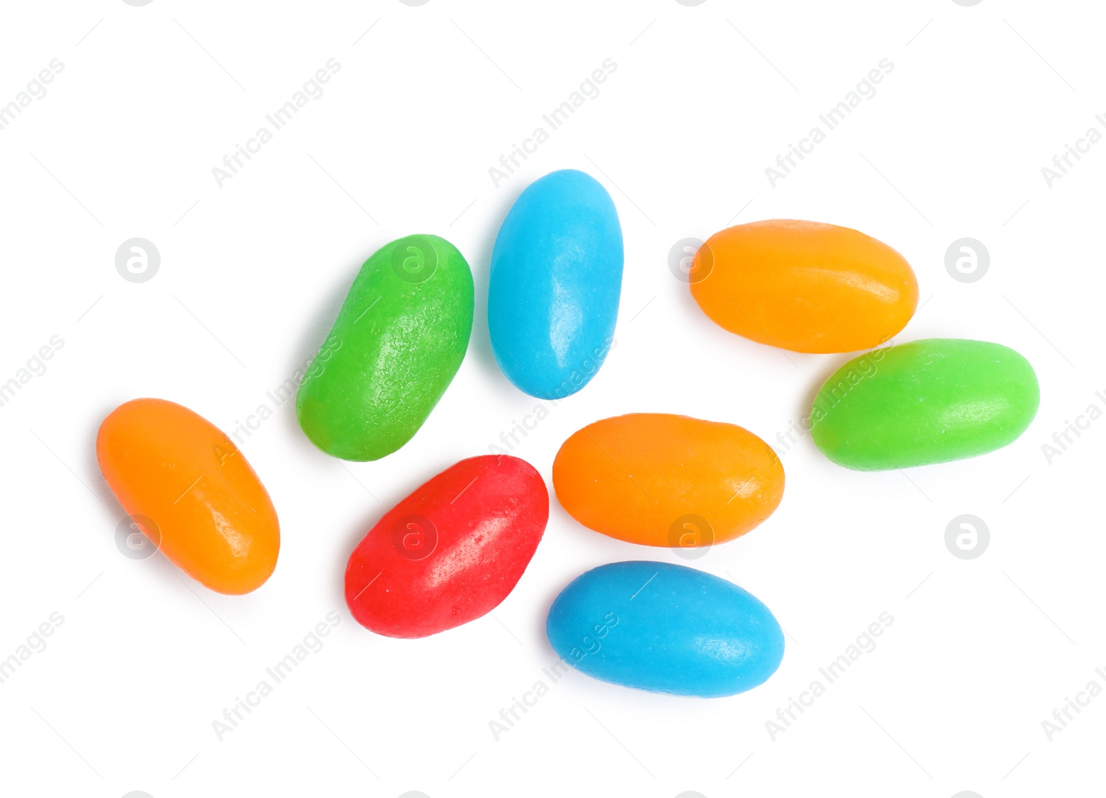 Photo of Delicious colorful jelly beans isolated on white, top view