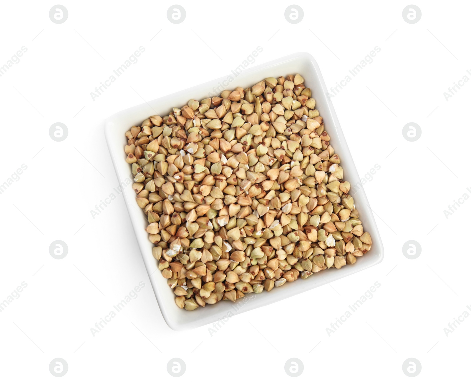 Photo of Green buckwheat in bowl isolated on white, top view