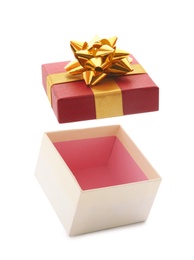 Photo of Open empty gift box with bow on white background