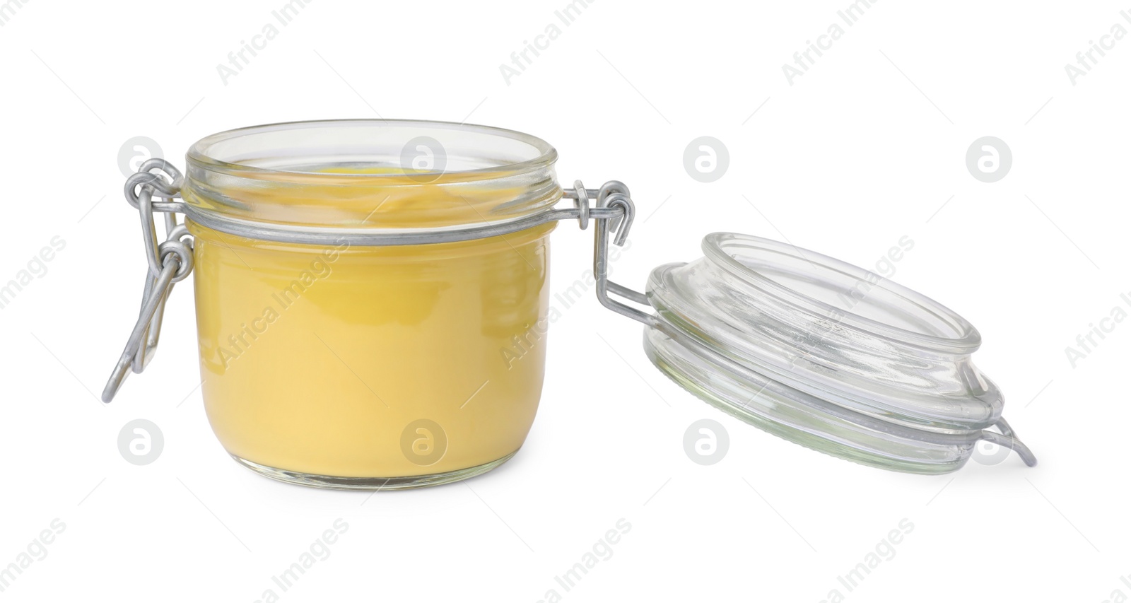 Photo of Spicy mustard in glass jar isolated on white