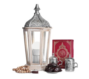 Decorative Arabic lantern, Quran, prayer beads, dates and coffee on white background
