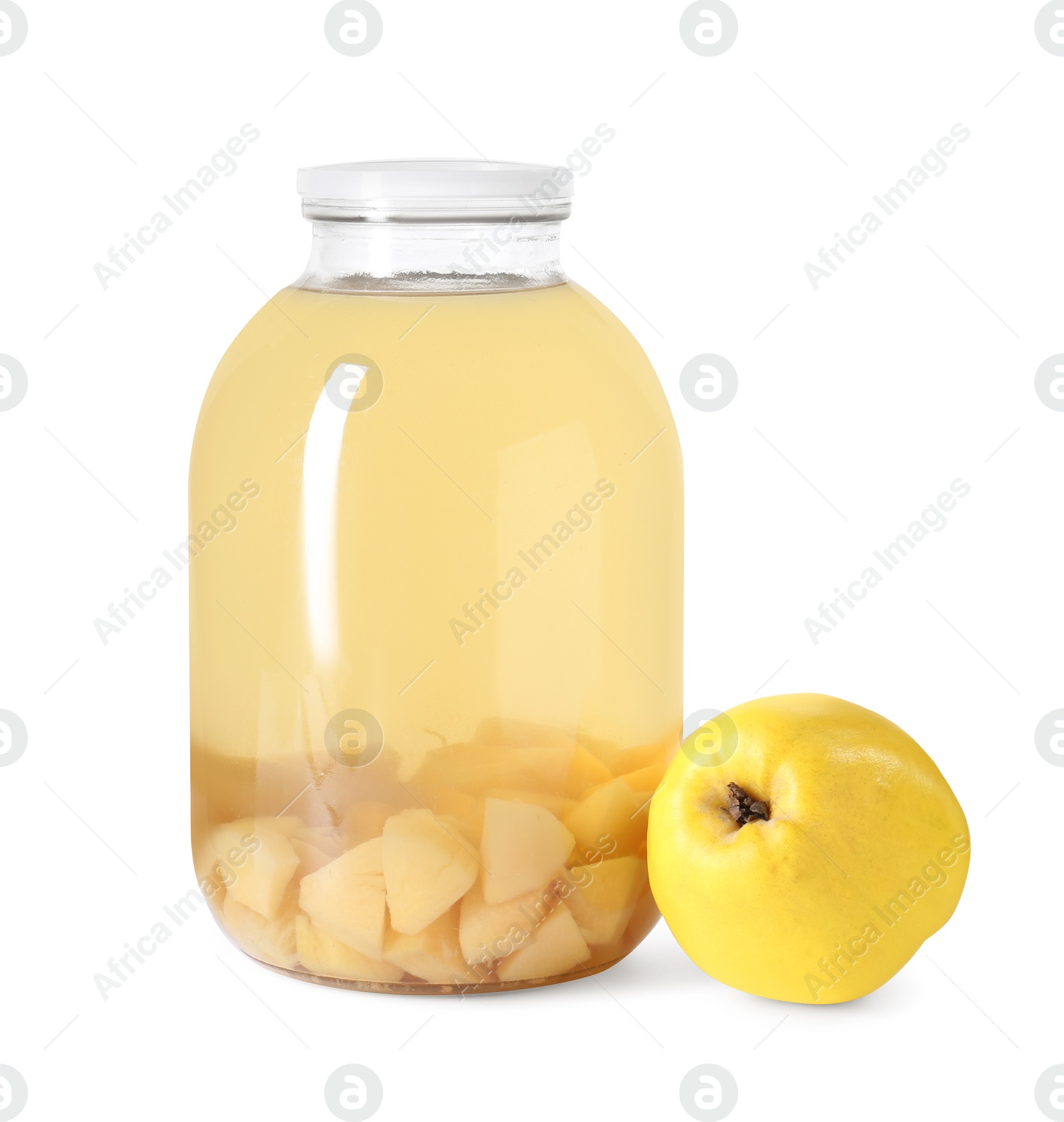 Photo of Delicious quince drink in glass jar and fresh fruit isolated on white