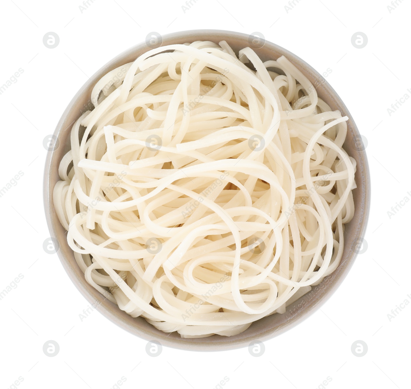 Photo of Bowl of tasty cooked rice noodles isolated on white, top view