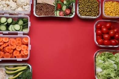 Different containers with fresh products on red background, flat lay. Space for text