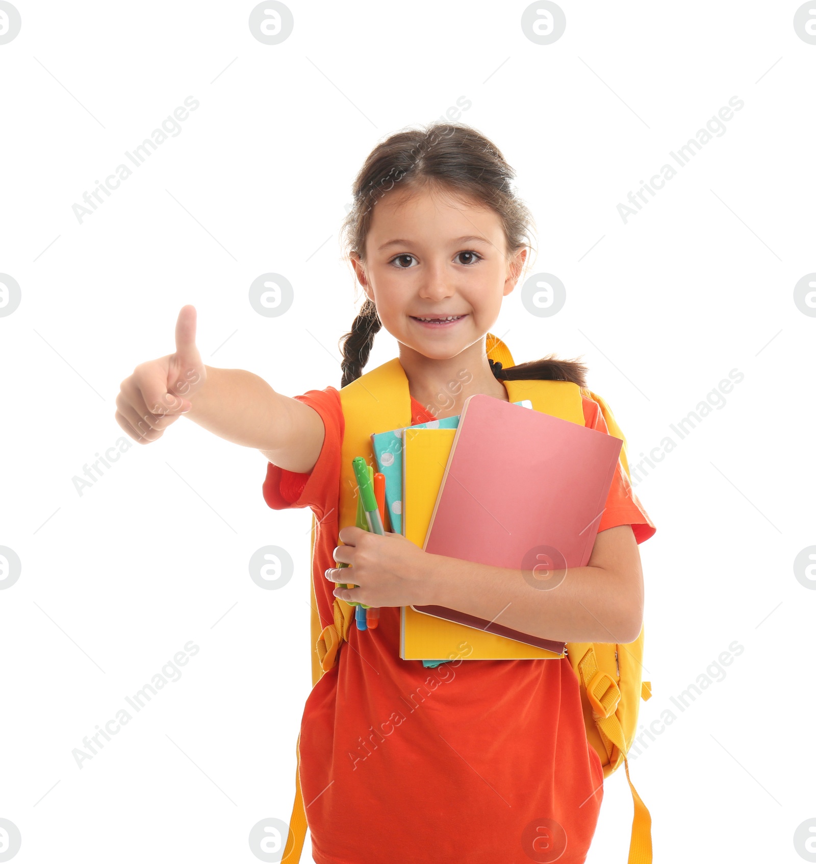 Photo of Cute child with school stationery on white background