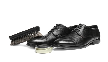 Photo of Stylish men's footwear and shoe care accessories on white background