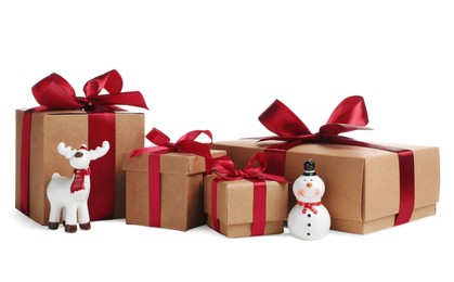 Photo of Gift boxes and Christmas decor on white background