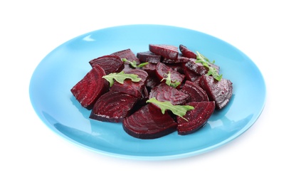 Plate with roasted beetroot slices and arugula isolated on white