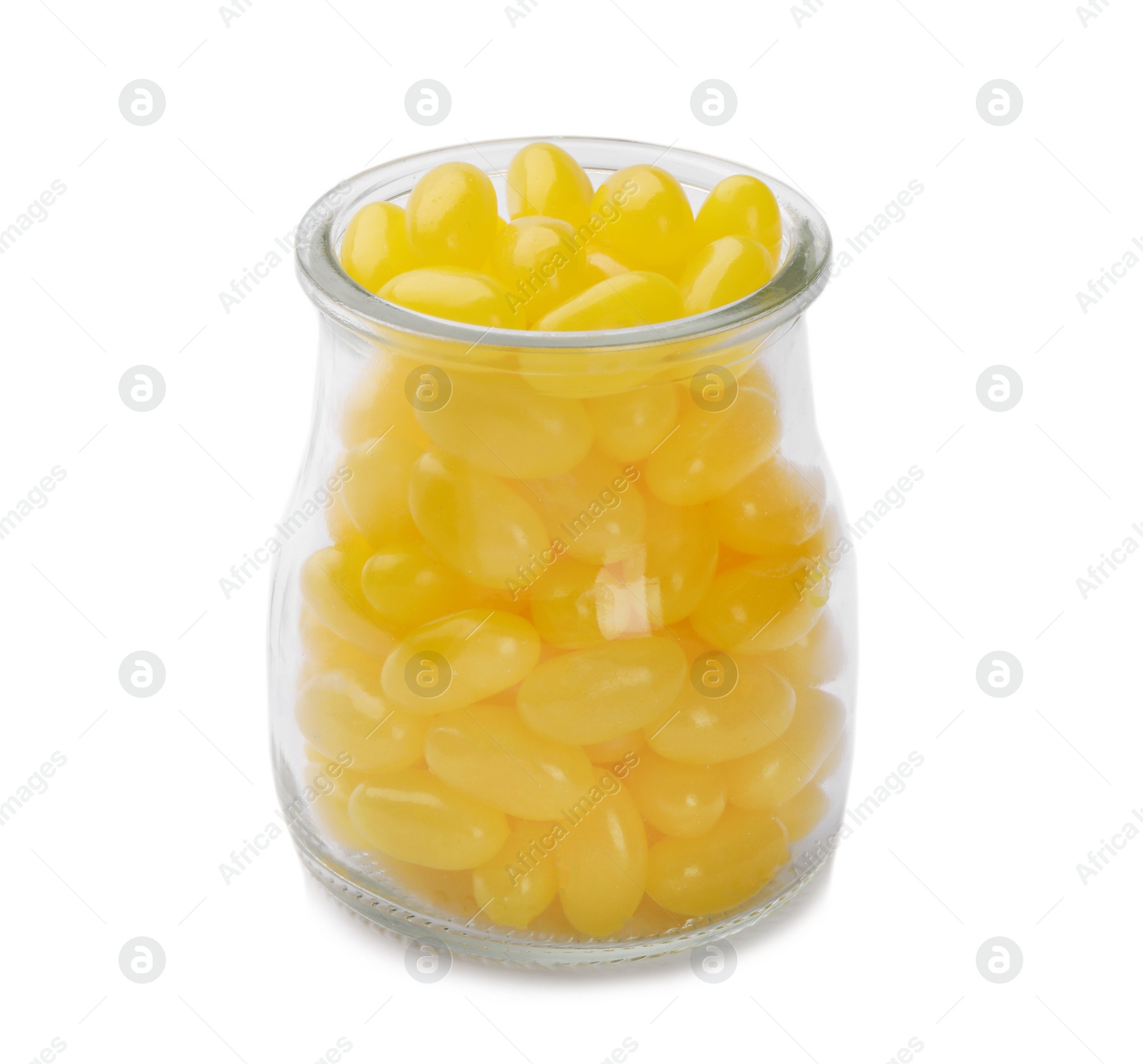 Photo of Tasty small lemon drops in glass jar isolated on white