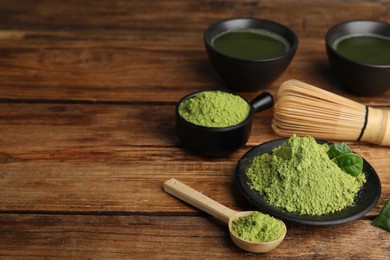 Photo of Composition with green matcha powder on wooden table, space for text