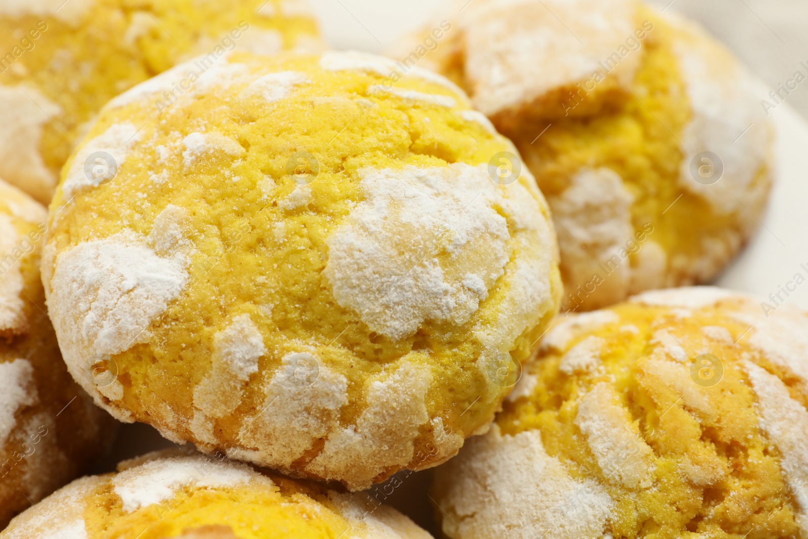 Photo of Tasty homemade lemon cookies on plate, closeup