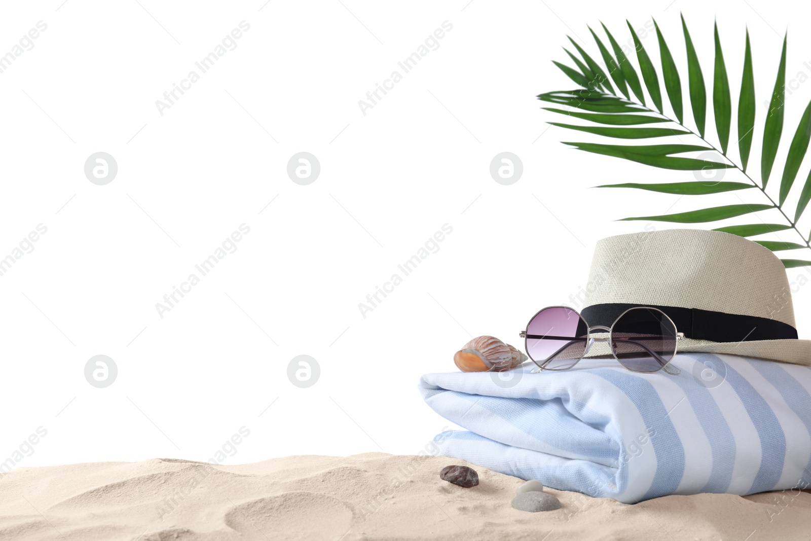 Photo of Composition with beach objects on sand against white background, space for text