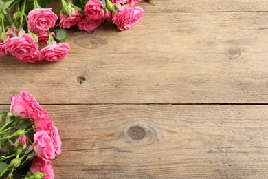 Photo of Happy Mother's Day. Beautiful flowers on wooden table, space for text