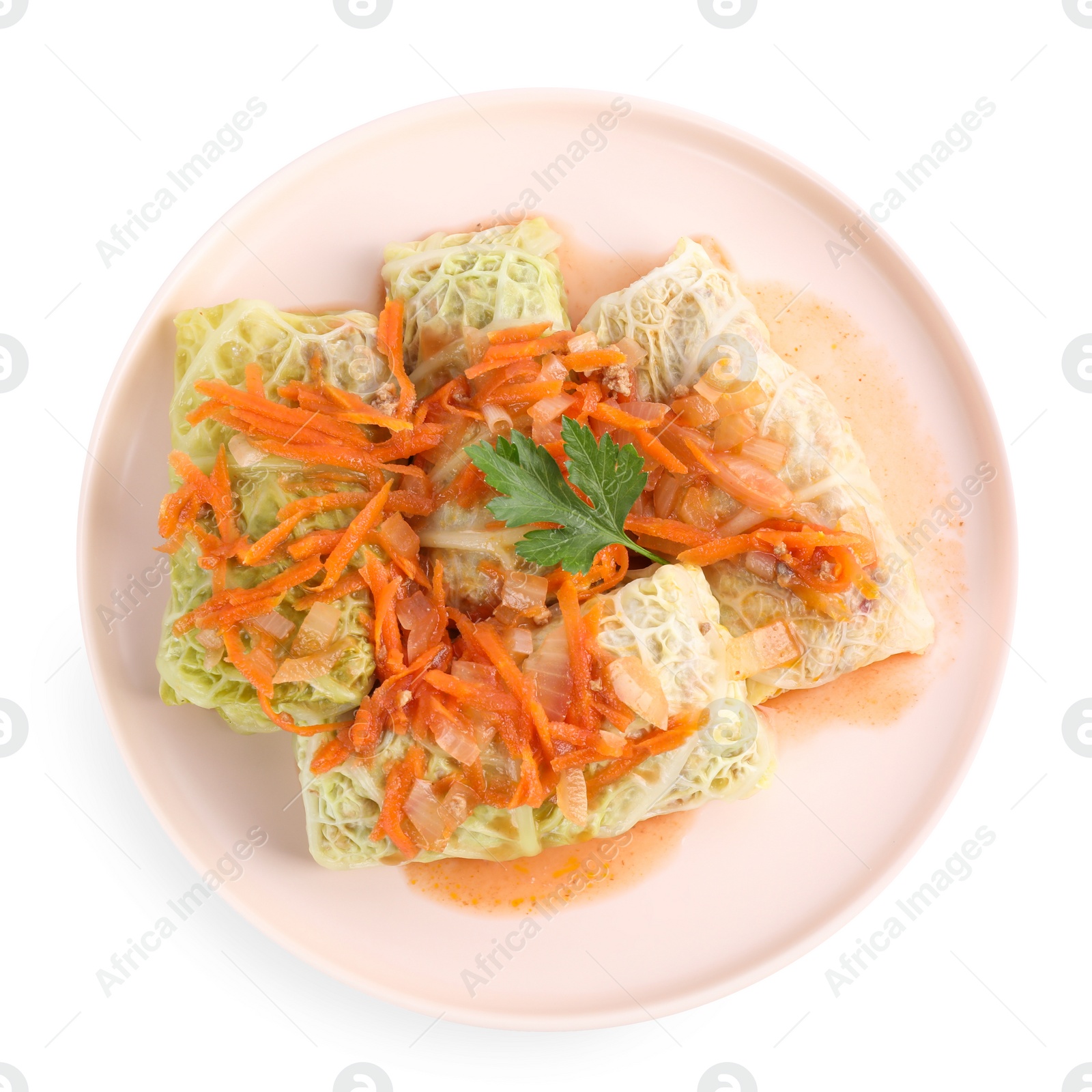 Photo of Delicious cabbage rolls isolated on white, top view