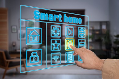 Image of Smart home system. Man using digital interface in room, closeup