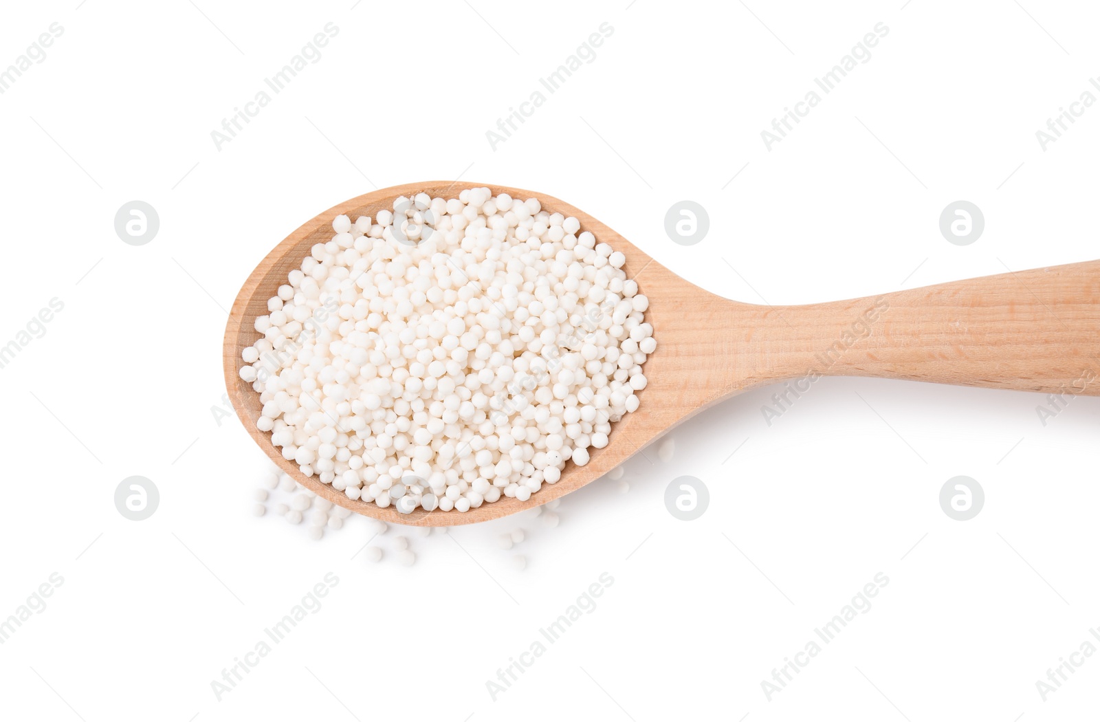 Photo of Spoon with tapioca pearls isolated on white, top view