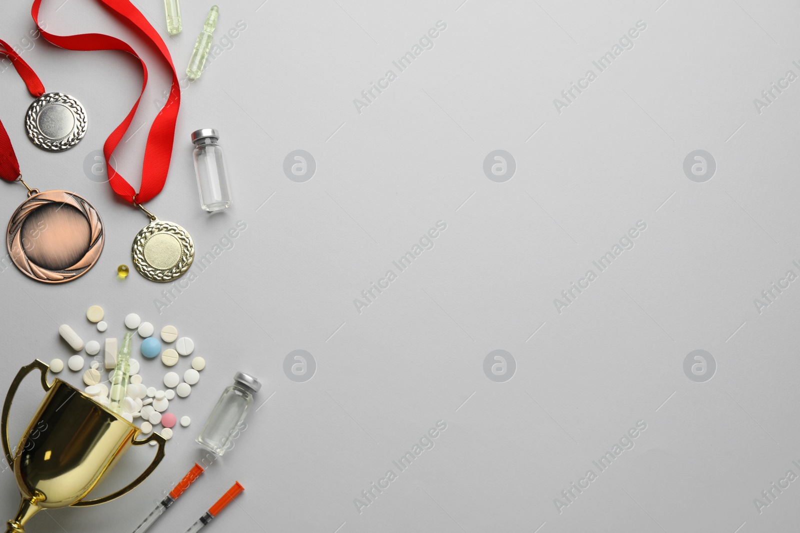 Photo of Flat lay composition with drugs on light grey background, space for text. Doping control