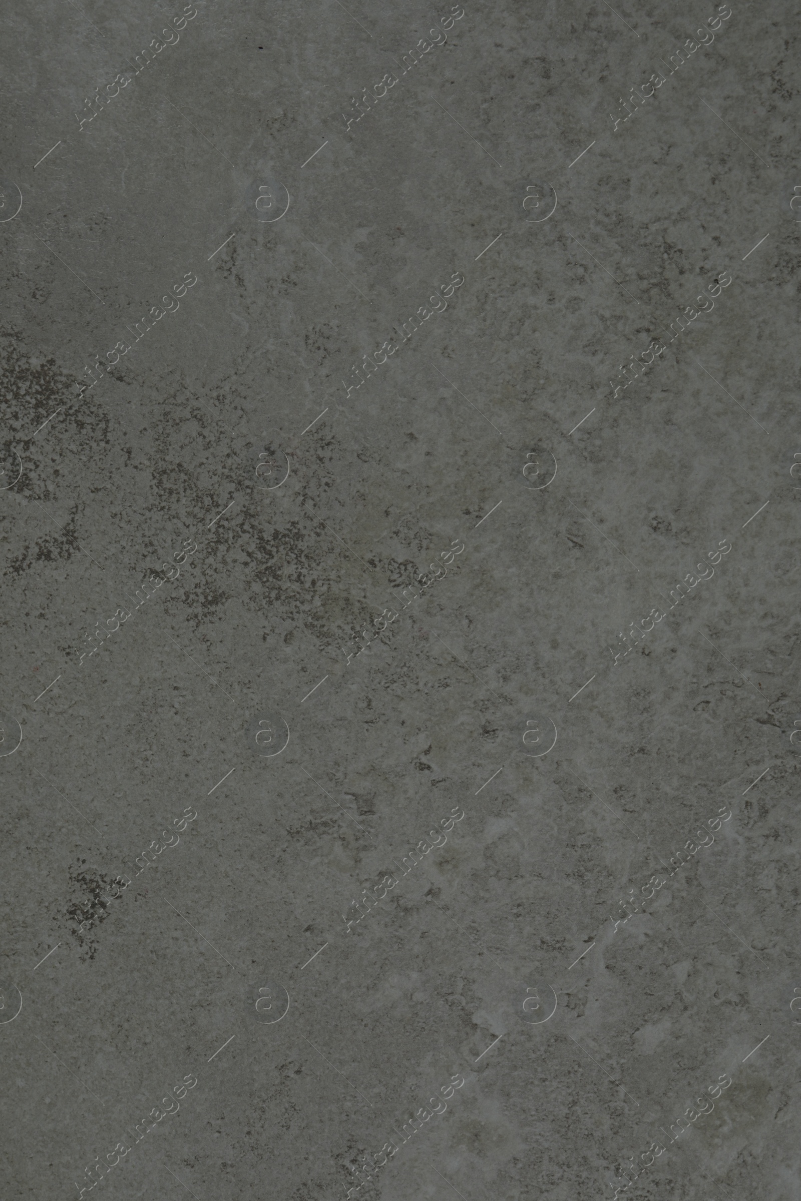 Photo of Texture of grey stone surface as background, closeup