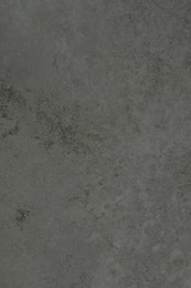 Texture of grey stone surface as background, closeup