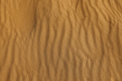 Photo of Closeup view of sand dune in desert as background