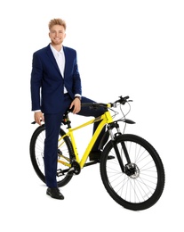 Photo of Young businessman with bicycle on white background