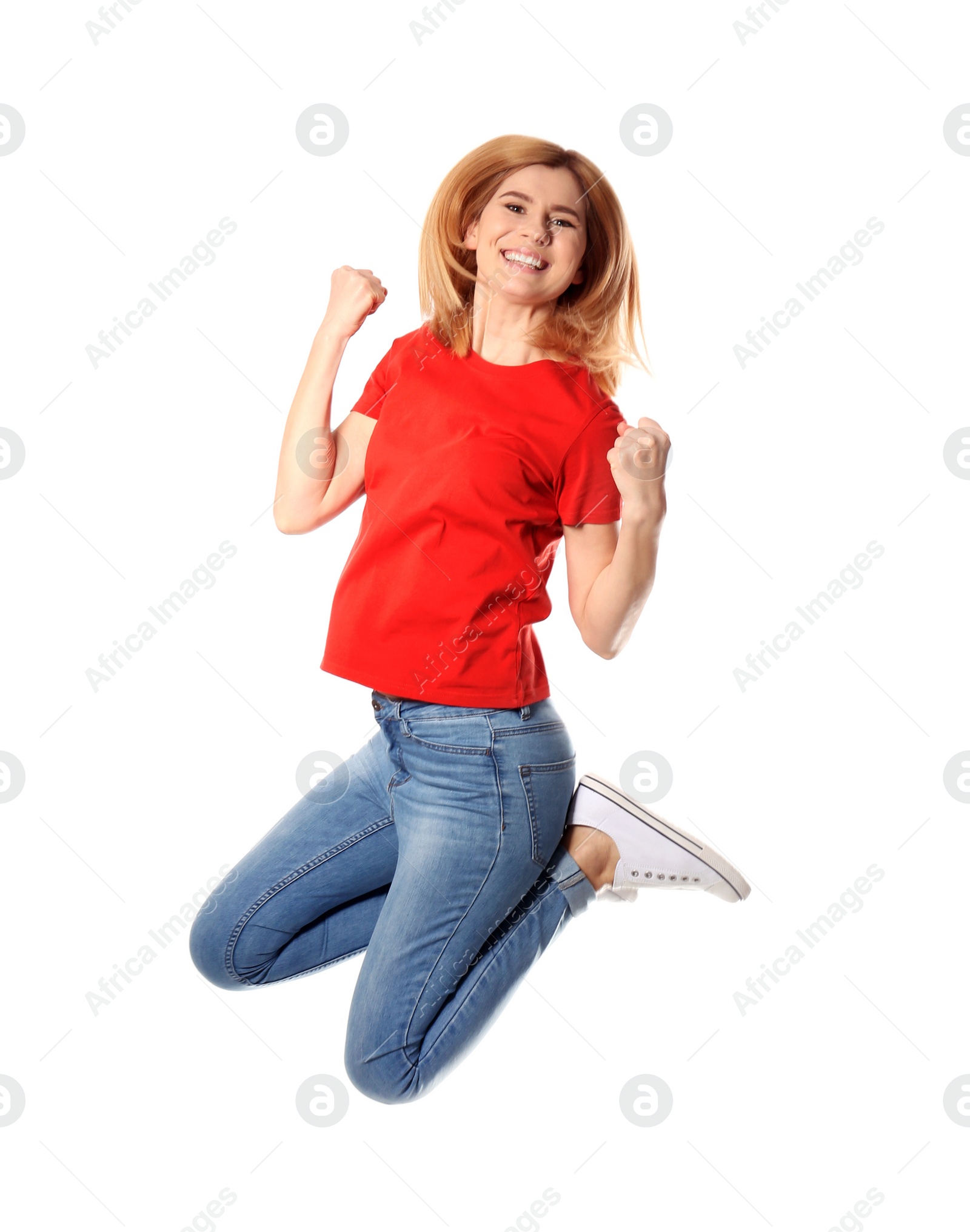 Photo of Full length portrait of happy beautiful woman jumping on white background