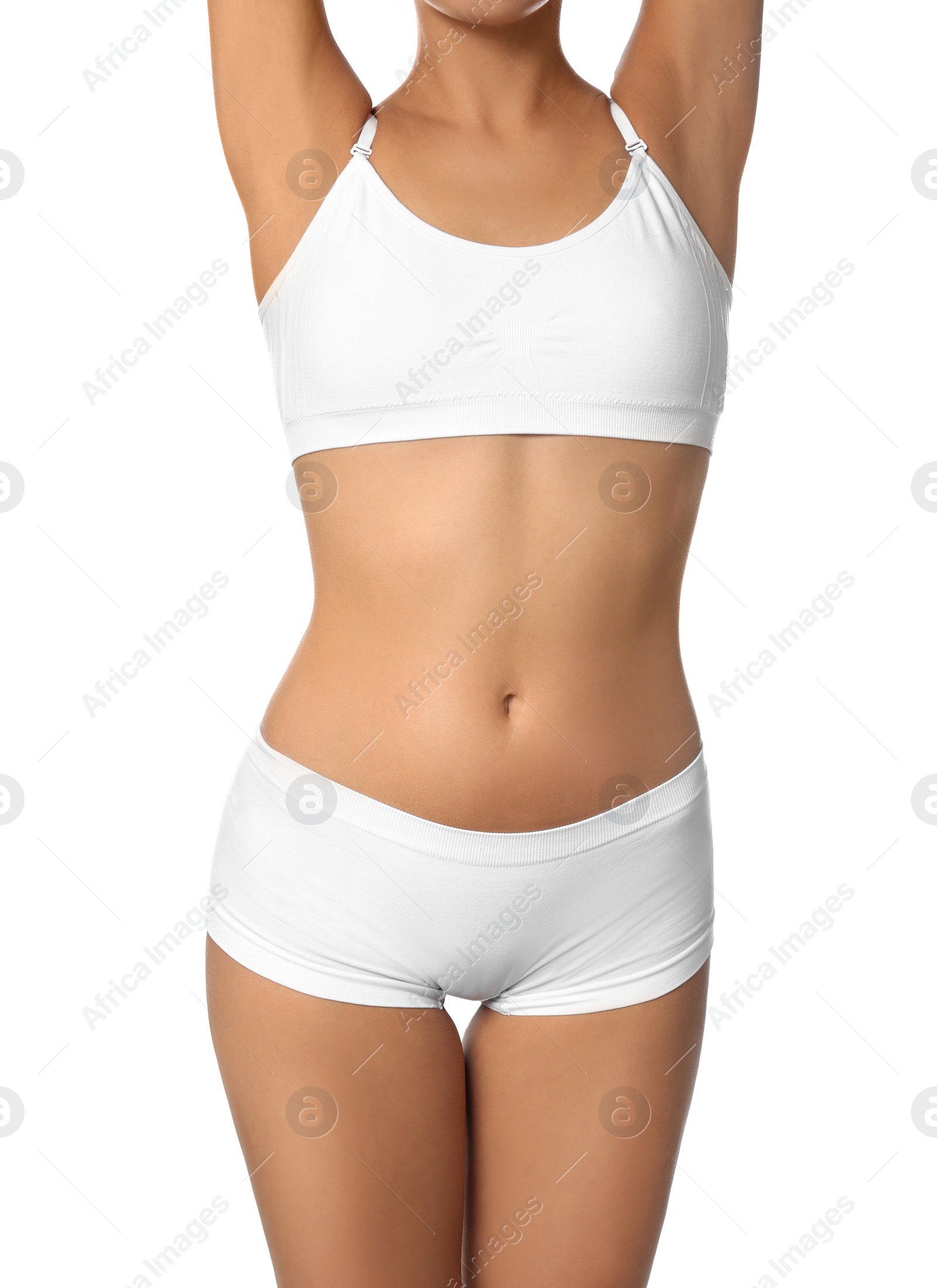 Photo of Young woman with slim body isolated on white, closeup. Plastic surgery concept