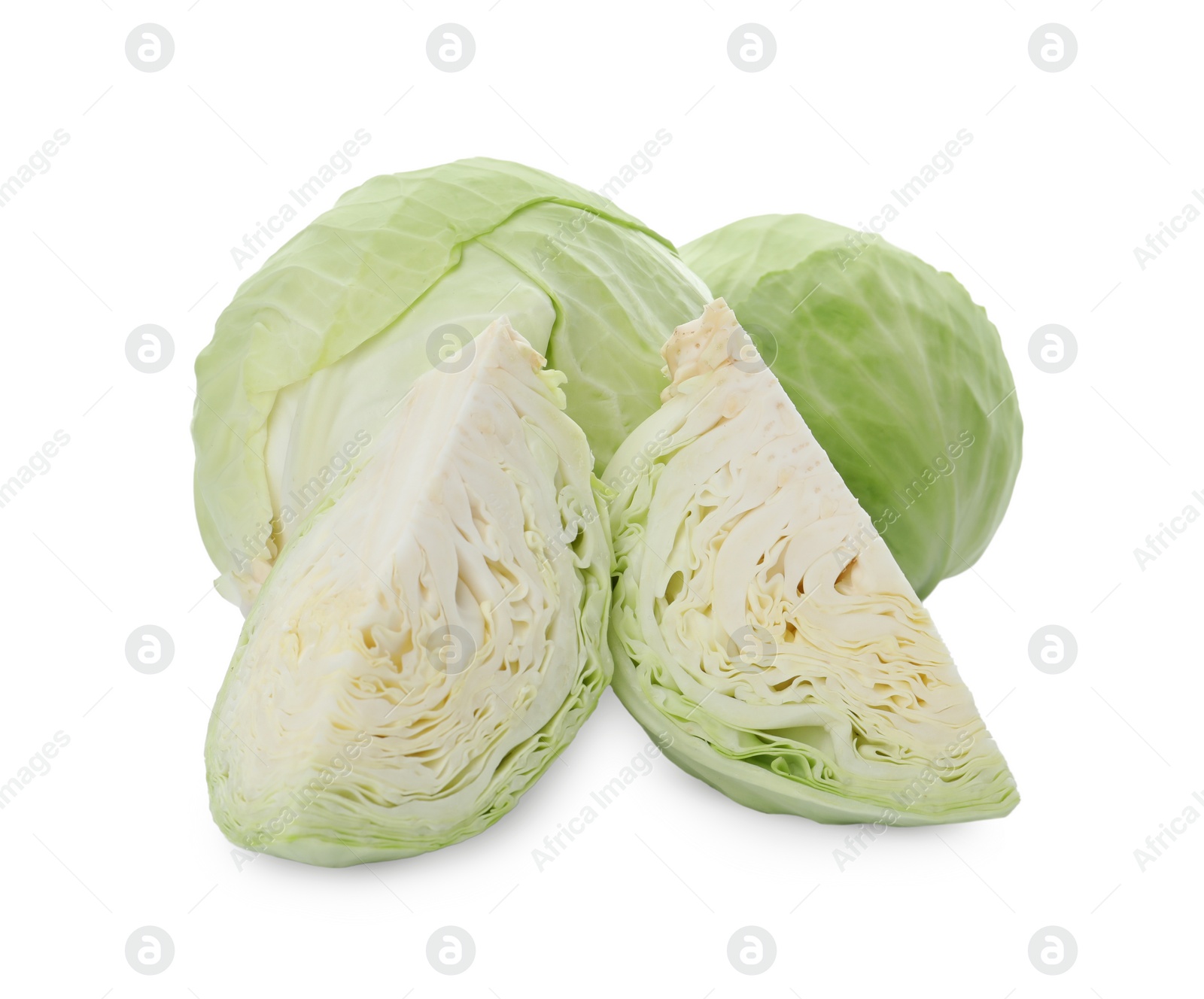 Photo of Whole and cut fresh ripe cabbages on white background